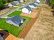 Aerial view of houses and neighborhood, showing lot sizes and landscaping at 123 Beacon Hill Rd # Hanover Craftsman, Lillington, NC 27546