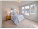 Bedroom with light blue bedding, wood nightstand, and carpeted floor at 123 Beacon Hill Rd # Hanover Craftsman, Lillington, NC 27546