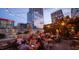 Rooftop patio with city views and string lights at 1329 Sanctuary Pond Dr, Raleigh, NC 27603