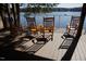 Relaxing lakefront deck with rocking chairs at 1329 Sanctuary Pond Dr, Raleigh, NC 27603