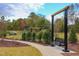 Park bench swing in a green space at 1329 Sanctuary Pond Dr, Raleigh, NC 27603