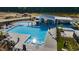 Community pool with lounge chairs, and a pool house at 213 Beacon Dr, Pittsboro, NC 27312