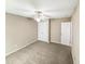 Large bedroom with ceiling fan, double-door closet and neutral carpet at 4425 Woodlawn Dr, Raleigh, NC 27616