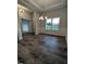 Bright dining room featuring hardwood floors and wainscoting at 680 Sweet Potato Lane # 34, Nashville, NC 27856