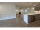 Open concept kitchen with island and stainless steel appliances at 231 Village Walk Dr, Clayton, NC 27527