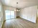 Bright dining room with sliding glass doors to patio at 231 Village Walk Dr, Clayton, NC 27527