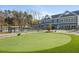 Community putting green beside clubhouse at 231 Village Walk Dr, Clayton, NC 27527