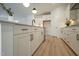 Modern kitchen with white cabinets and quartz countertops at 154 Swain St, Clayton, NC 27527