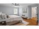 Bright bedroom with a comfortable bed and access to a hallway at 4937 Carteret Dr, Raleigh, NC 27612