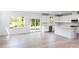 Kitchen with island, stainless steel appliances and access to backyard at 81 Hank Way, Angier, NC 27501