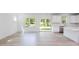 Open concept kitchen with island and backyard access at 81 Hank Way, Angier, NC 27501