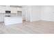 Open concept kitchen with island and stainless steel appliances at 81 Hank Way, Angier, NC 27501