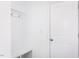 Bright entryway with built-in bench and coat hooks at 81 Hank Way, Angier, NC 27501