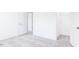 Bedroom with carpet and access to bathroom and closet at 81 Hank Way, Angier, NC 27501