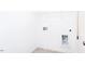 Clean laundry room with shelving and space for washer/dryer at 81 Hank Way, Angier, NC 27501
