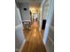 Hardwood floor hallway with access to other rooms at 107 E D St, Erwin, NC 28339