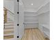 Spacious basement closet with built-in shelving at 5121 Watkinsdale Ave, Raleigh, NC 27613