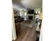 Living room with fireplace, TV, and comfortable seating at 7253 Hunt Valley Trl, Wendell, NC 27591
