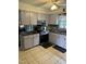 Kitchen with granite countertops and stainless steel appliances at 7253 Hunt Valley Trl, Wendell, NC 27591