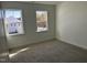 Well lit bedroom with carpet and dual windows at 1189 Barreto Dr, Wendell, NC 27591