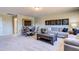 Versatile bonus room with a sectional sofa and game table at 3102 Castlerock Dr # 2, Burlington, NC 27215