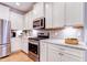 Modern kitchen featuring stainless steel appliances and granite countertops at 3102 Castlerock Dr # 2, Burlington, NC 27215