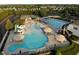 Resort-style pool area with water features and a ' pool at 3102 Castlerock Dr # 2, Burlington, NC 27215