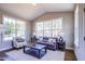 Sunroom with vaulted ceiling, large windows, and comfortable seating area at 3102 Castlerock Dr # 2, Burlington, NC 27215