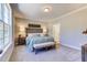 Bright bedroom with carpeted floor and a comfy sitting area at 3102 Castlerock Dr # 2, Burlington, NC 27215