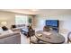 Spacious bonus room perfect for entertaining, featuring a large TV and game table at 3102 Castlerock Dr # 2, Burlington, NC 27215