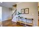 Elegant hallway with hardwood floors and stylish console table at 3102 Castlerock Dr # 2, Burlington, NC 27215
