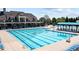 Community lap pool with plenty of lounge chairs at 3102 Castlerock Dr # 2, Burlington, NC 27215