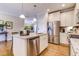 Modern kitchen with stainless steel appliances and granite countertops at 3102 Castlerock Dr # 2, Burlington, NC 27215
