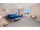 Spacious main bedroom with plush carpet and large windows at 6920 Will Let Ln, Wake Forest, NC 27587