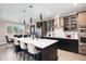 Modern kitchen with stainless steel appliances and an island at 6920 Will Let Ln, Wake Forest, NC 27587