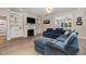 Spacious living room with a fireplace and sectional sofa at 6920 Will Let Ln, Wake Forest, NC 27587