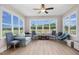 Bright sunroom with ample natural light and comfortable seating at 6920 Will Let Ln, Wake Forest, NC 27587