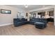 Open concept living room with a view into the kitchen at 6920 Will Let Ln, Wake Forest, NC 27587