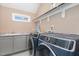 Laundry room with washer, dryer, and cabinets at 6920 Will Let Ln, Wake Forest, NC 27587