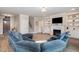 Open living room showcasing a sectional sofa and fireplace at 6920 Will Let Ln, Wake Forest, NC 27587