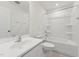 Clean bathroom featuring a shower/tub combo and vanity at 1431 Goldsboro Ave, Sanford, NC 27330