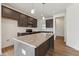 Modern kitchen with stainless steel appliances and granite countertops at 1431 Goldsboro Ave, Sanford, NC 27330