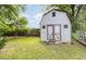 Large backyard with storage shed and green lawn at 2912 Omah St, Durham, NC 27705