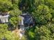 Aerial view of a house and driveway surrounded by trees at 449 Captain Hbr, Sanford, NC 27332