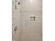 Clean shower with gray tile and a built-in niche at 503 Damascus Church Rd, Chapel Hill, NC 27516