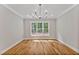 Bright office features hardwood floors and a large window at 503 Damascus Church Rd, Chapel Hill, NC 27516