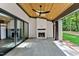 Relaxing outdoor patio with fireplace and sliding glass doors at 503 Damascus Church Rd, Chapel Hill, NC 27516