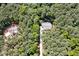 Aerial view of two homes nestled in a wooded lot at 503 Damascus Church Rd, Chapel Hill, NC 27516