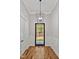 Bright entryway with hardwood floors and a view of the backyard at 503 Damascus Church Rd, Chapel Hill, NC 27516