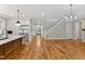 Modern kitchen with hardwood floors, stainless steel appliances, and an island at 503 Damascus Church Rd, Chapel Hill, NC 27516